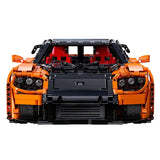 Vue de profil Mazda RX-7 VeilSide Fortune en briques CaDA